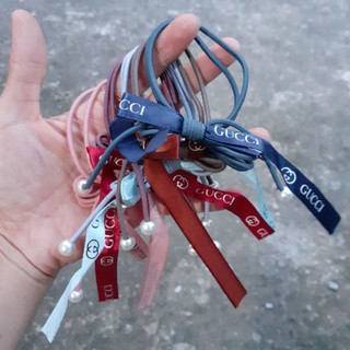 Dây cột tóc hoa rơi in chữ Hàn Quốc(được chọn màu)