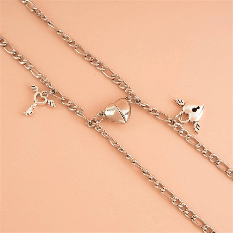 Set 2 Vòng Tay Thép Titan Mặt Khóa Trái Tim Có Nam Châm Thời Trang Cho Cặp Đôi