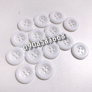 Nút men 4 lỗ bóng đen trắng giá 10 nút