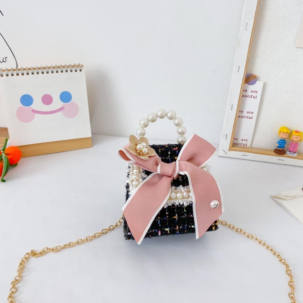 Túi xách mini quai ngọc phối dạ nơ xinh xắn cho bé