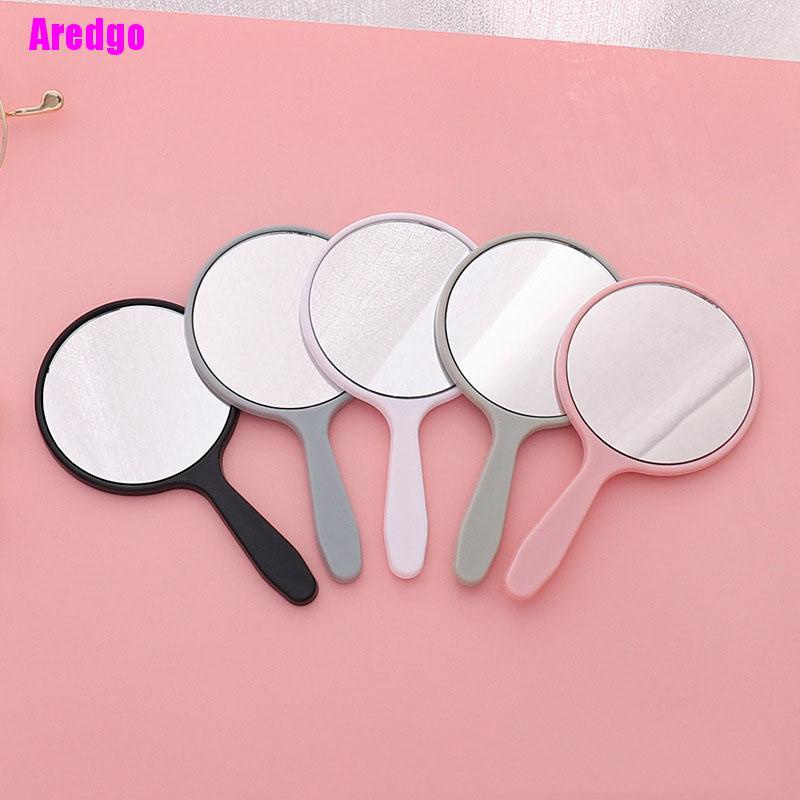 Gương trang điểm cầm tay hình tròn có tay cầm tiện lợi