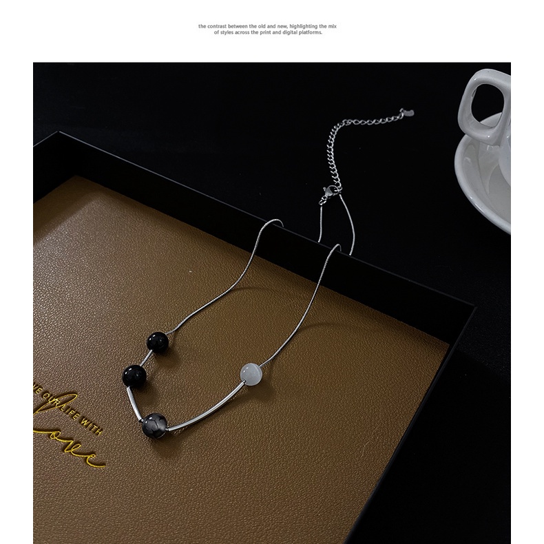 Dây chuyền chuỗi hạt tròn màu đen phong cách cổ điển