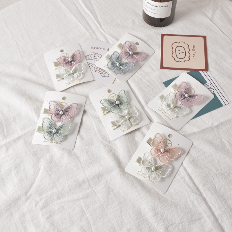 Kẹp Tóc Hình Bướm Đính Ngọc Trai Xinh Xắn Cho Bé