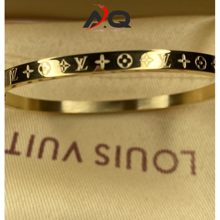 Vòng Tay titan lắc tay LV Kim Loại Khắc Họa Tiết Chữ Louis Vuitton Độc Đáo Thời Trang 2023