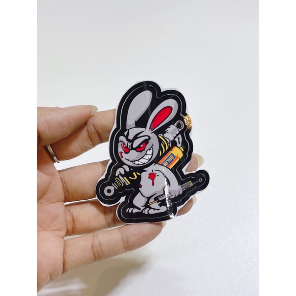 Tem dán hình thỏ điên cầm phuộc Olin, thỏ tay cầm trợ lực kích thước 6x5cm có sẵn keo dán