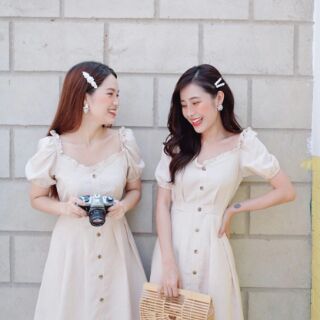Đầm caro nút gỗ tay phồng