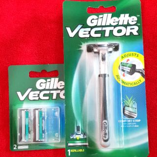 Bộ Dao cạo râu Gillette Vector và vỉ 2 lưỡi thay thế cùng loại.