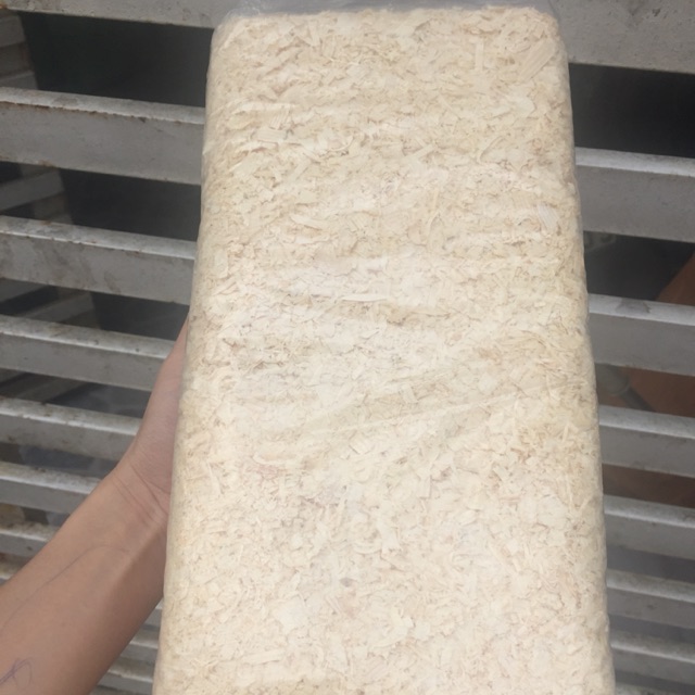 Mùn cưa nén 1kg gỗ thông loại đẹp dùng lót chuồng thú cưng, mùn cưa hamster