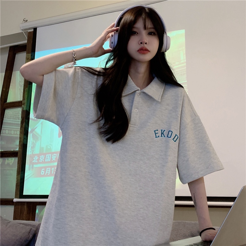 Áo polo SUXI tay ngắn dáng rộng màu trơn thêu chữ thời trang cho nữ