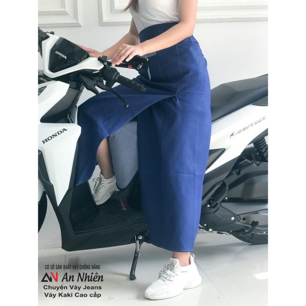 giá sỉ Váy chống nắng JEAN trơn xẻ tà cố định bằng miếng dán kết hợp nút bấm có túi phía trước