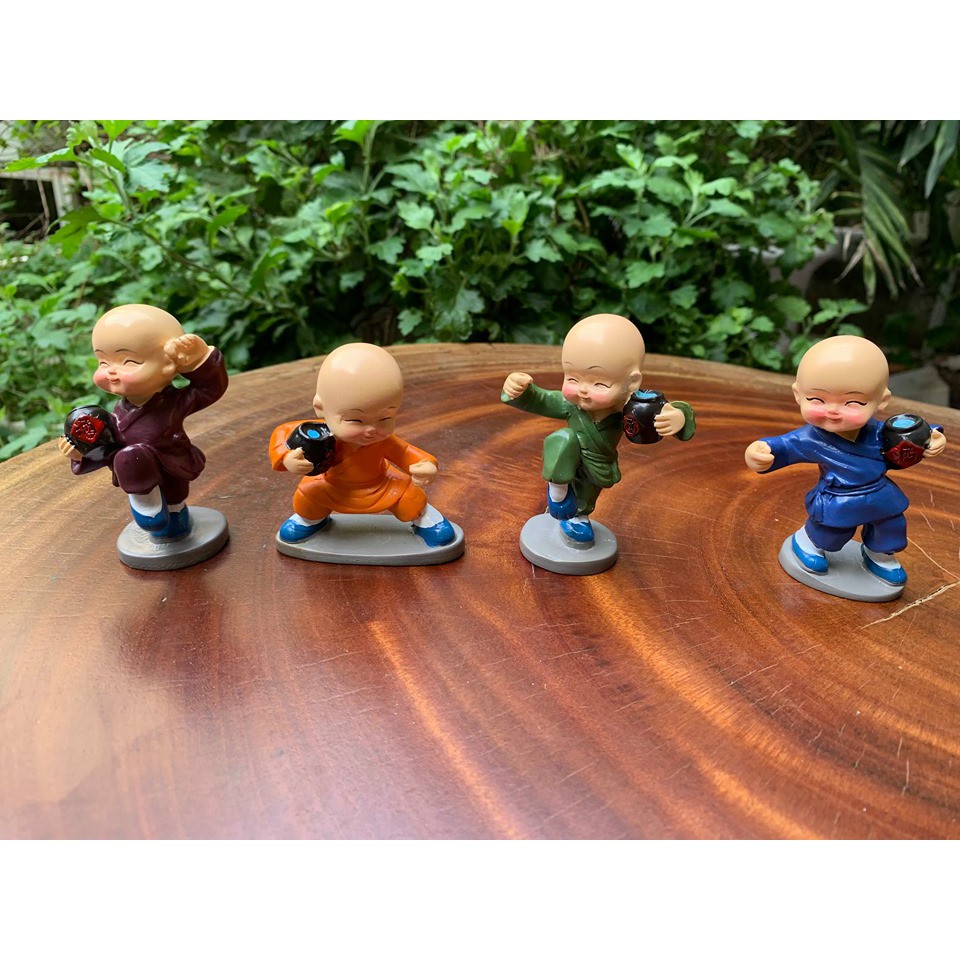 Tượng 4 chú tiểu để taplo ô tô