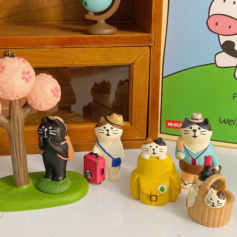 Mô hình mèo chủ đề du lịch