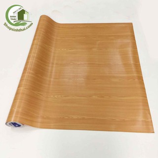 Giấy dán tường giả gỗ màu vàng nhạt, khổ 1,2m có sẵn keo