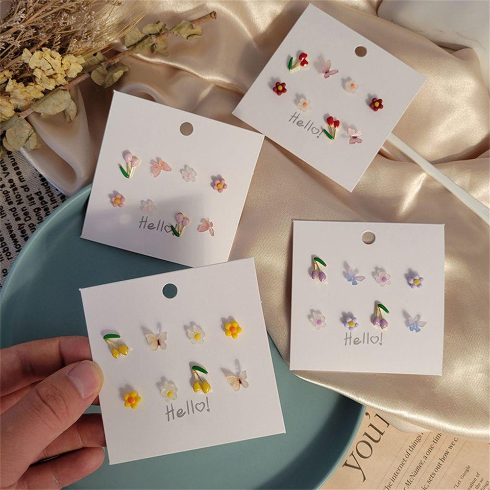 Set 1 8 Khuyên Tai Mini Họa Tiết Hoa / Bướm Thời Trang Dự Tiệc Cho Nữ