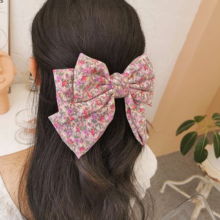 Kẹp tóc nơ hoa nhí tiểu thư