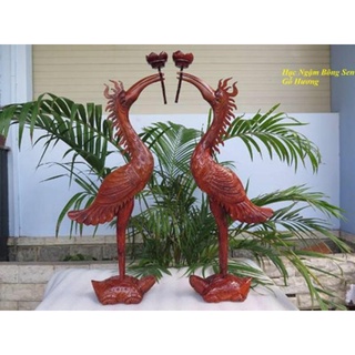 Hạc thờ gỗ hương cao 50cm ngậm hoa gỗ gia lai