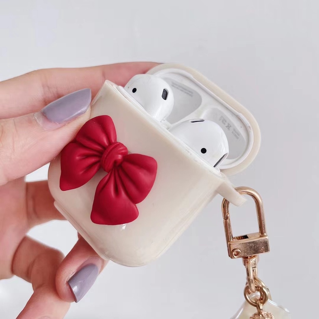 Vỏ Bảo Vệ Hộp Sạc Tai Nghe Bluetooth Apple Airpods 1 / 2 Pro Bằng Tpu Chống Thất Lạc Hình Nơ Màu Trắng