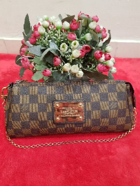 Cầm tay , đeo vai