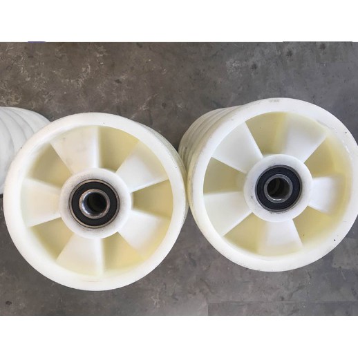 Bánh xe nâng tay nylong trắng 180*50mm có sẵn 2 bạc đạn 6204