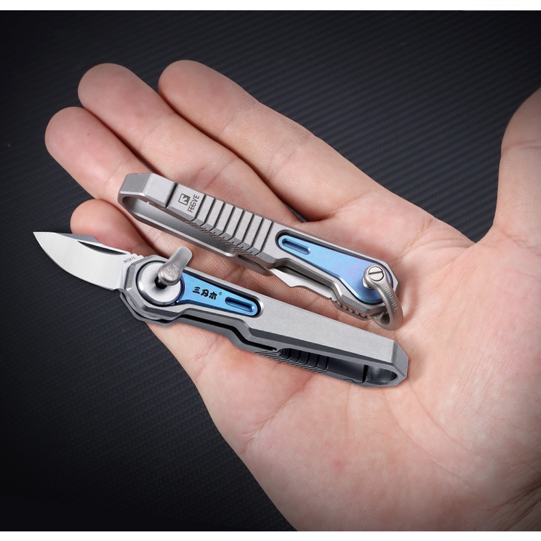 Móc khóa Titanium đa năng kèm lưỡi dao rọc Sanrenmu SK061
