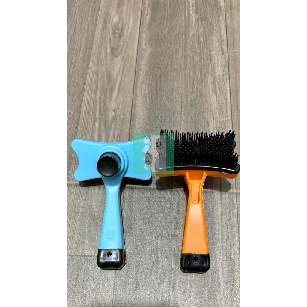 Lược nhựa chải lông nút bấm tự làm sạch