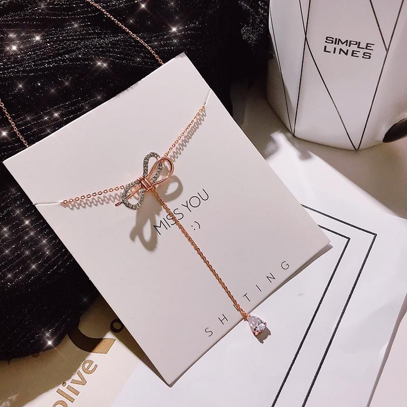 Dây chuyền nơ thả hạt đá vòng cổ phụ kiện nữ thiết kế thời trang phong cách Hàn Quốc