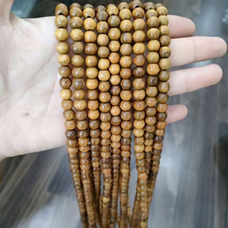 chuỗi hạt 108 vòng tay nữ hoa sen hạt tròn 6 ly gỗ thơm bach màu tự nhiên