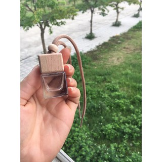 Combo 20 chai tinh dầu treo xe vuông nắp gỗ + 100 bi lăn nắp bạc