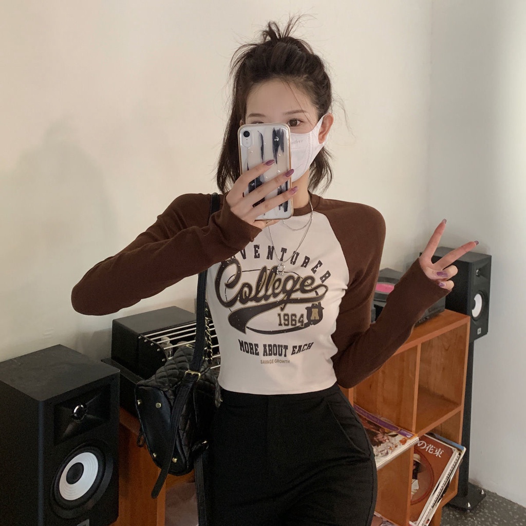 Áo thun tay dài in họa tiết màu sắc tương phản đầy phong cách cho nữ