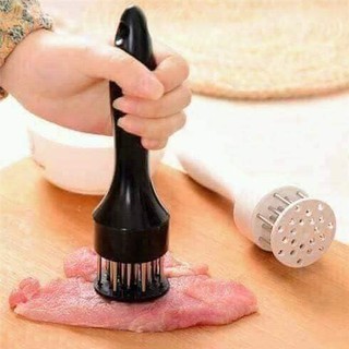 Dụng cụ dập thịt .