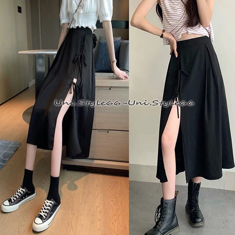 Chân váy đen xẻ tà thắt nơ cá tính có quần bên trong US152