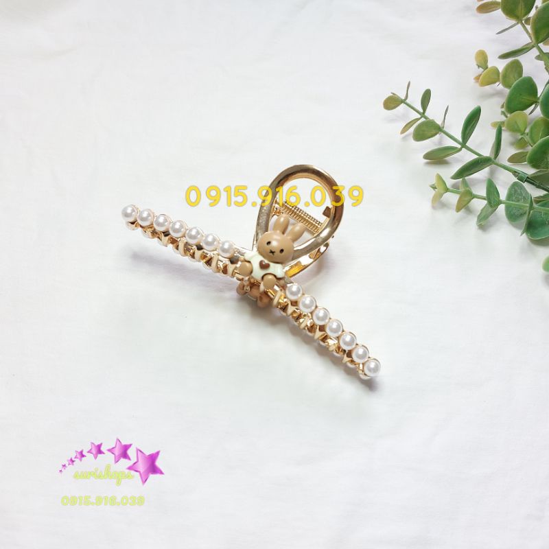 Kẹp tóc dạng T chéo kim loại màu vàng