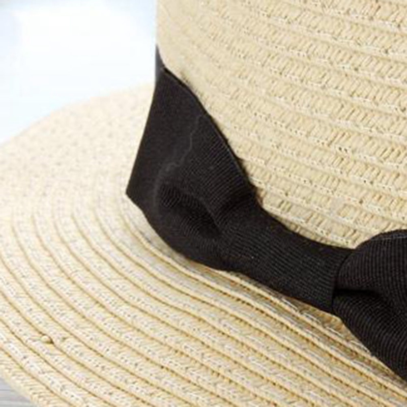 Nón cói rộng vành đan từ sợi rơm có dây ruy băng cho bé