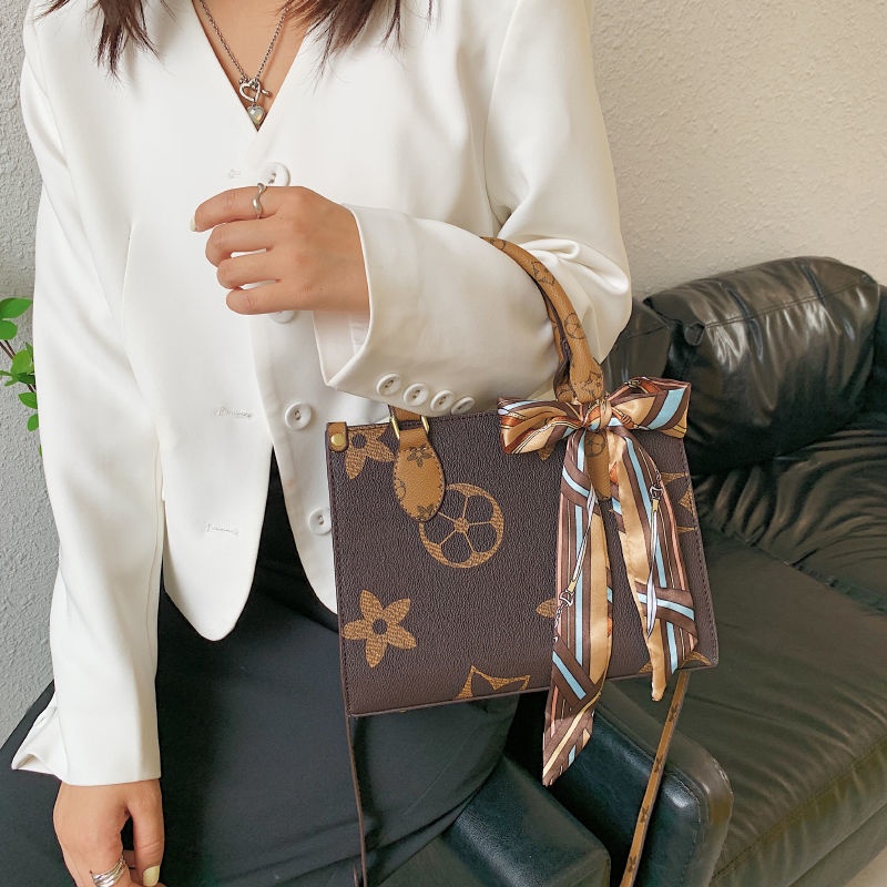 Túi Xách Da Đeo Chéo Đính Nơ Thời Trang Nữ Tính