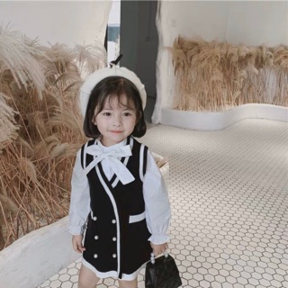 Set váy gile đen kèm áo trắng cổ nơ