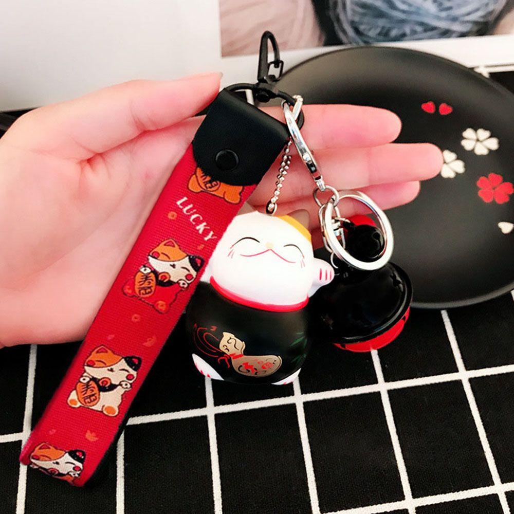 1 Móc Khóa Hình Mèo May Mắn Kèm Chuông Giá Đỡ Túi Xách