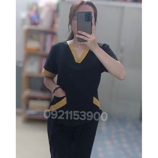 Đồng phục spa màu đen viền vàng