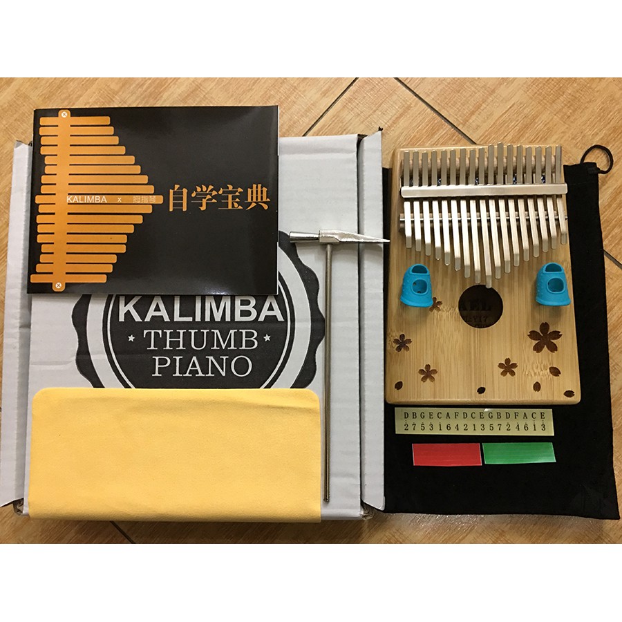 Đàn Kalimba 17 phím Woim Gỗ Tròn Hoa Tặng Kèm Kèn Kazoo - HÀNG CÓ SẴN