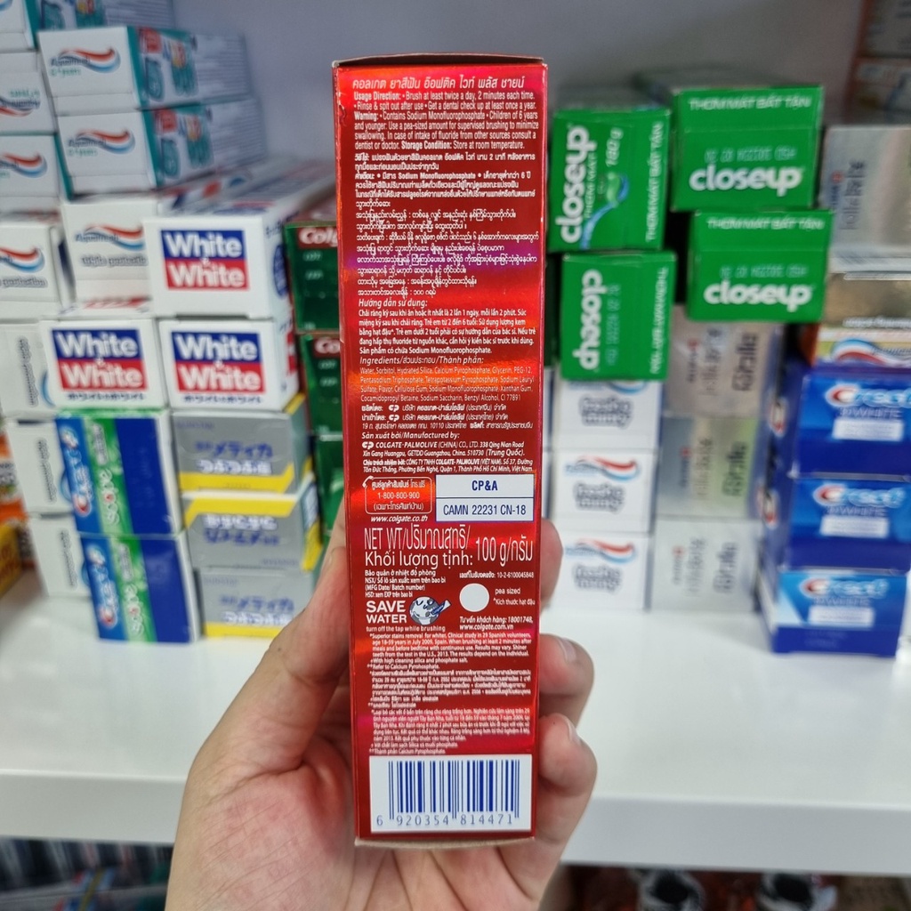 Kem đánh trắng răng COLGATE Optic White Plus Shine 100g [trắng sáng răng sau 1 tuần sử dụng]