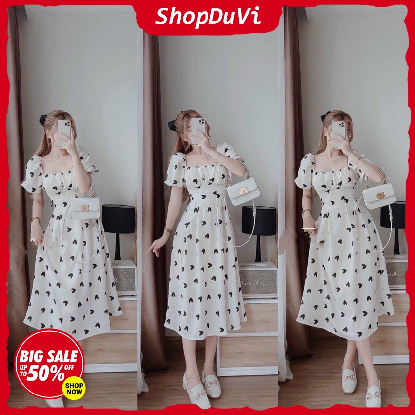 Đầm Tiểu Thư Tay Phồng Nhún Ngực Kiểu Xòe Họa Tiết Tim Đen Đính Nơ Sau Phối Màu