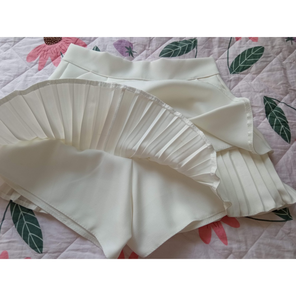 Chân váy xếp ly 2 tầng dập vải tuyết mưa