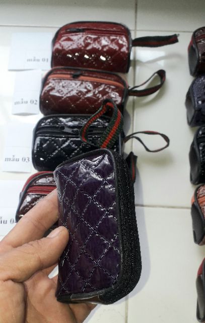 Một cái ví_bóp da Pu mini đa năng 2 dây kéo kích thước 10x6x3 cm rất đẹp