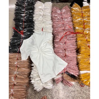 Áo thun dáng chất cotton xoắn cách điệu
