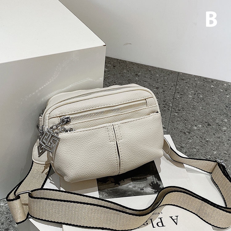 Túi xách đeo vai khóa kéo hoa văn