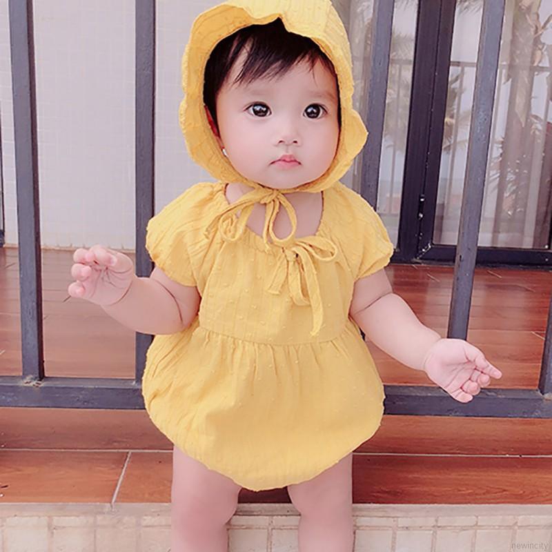 Set jumpsuit cổ tròn tay phồng + nón cho bé