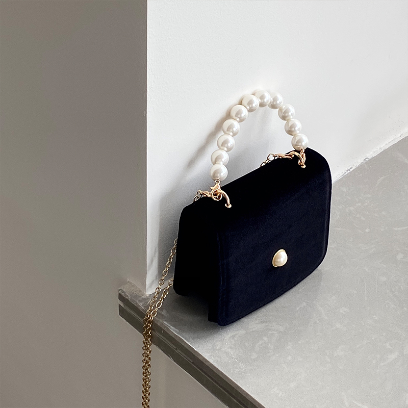 Túi da có tay cầm ngọc trai hợp thời trang  trẻ trung cho nữ