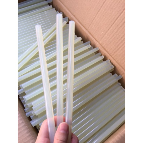 1 cây keo nến to kt: 1.1x25cm dùng cho súng/máy bắn keo to