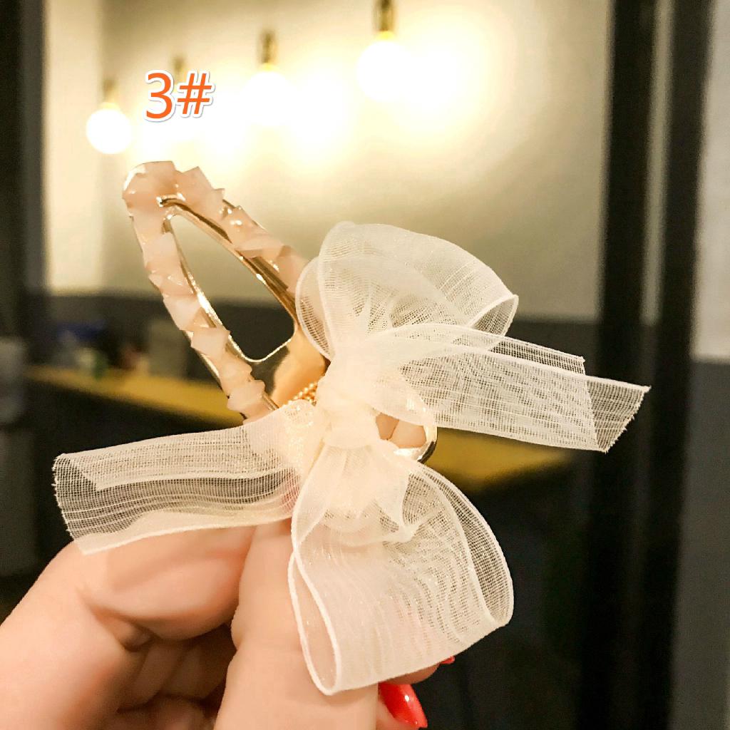 Kẹp tóc nơ đính đá thời trang nữ