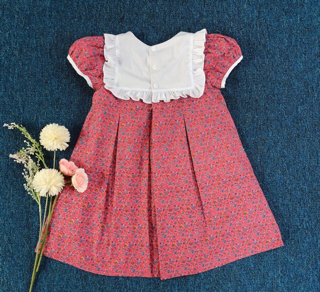 Váy xinh viền cổ bèo cho bé