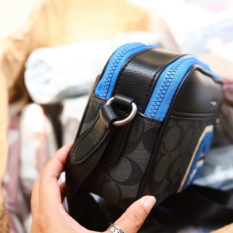 Túi đeo chéo Coach dây bản to unisex